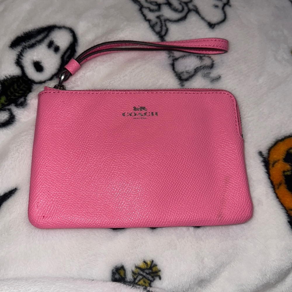 Neon pink coach wristlet